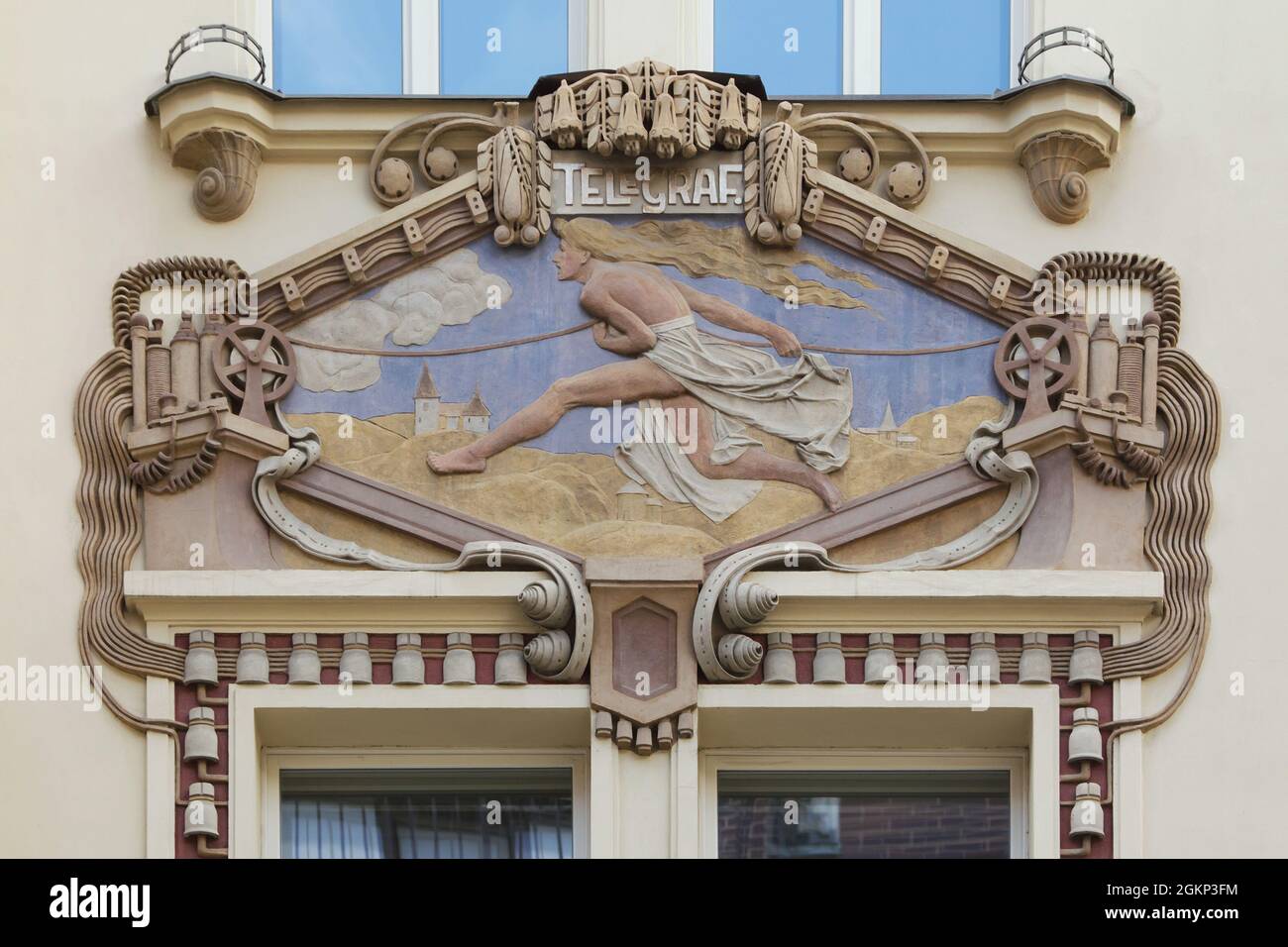 Telegraph depicted in the stucco relief on the Edvard Beaufort Publishing (Beaufortovo nakladatelství) in Nové Město (New Town) in Prague, Czech Republic. The Art Nouveau building designed by Czech architect Osvald Polívka was built from 1907 to 1910 in Jungmannova Street. Stock Photo