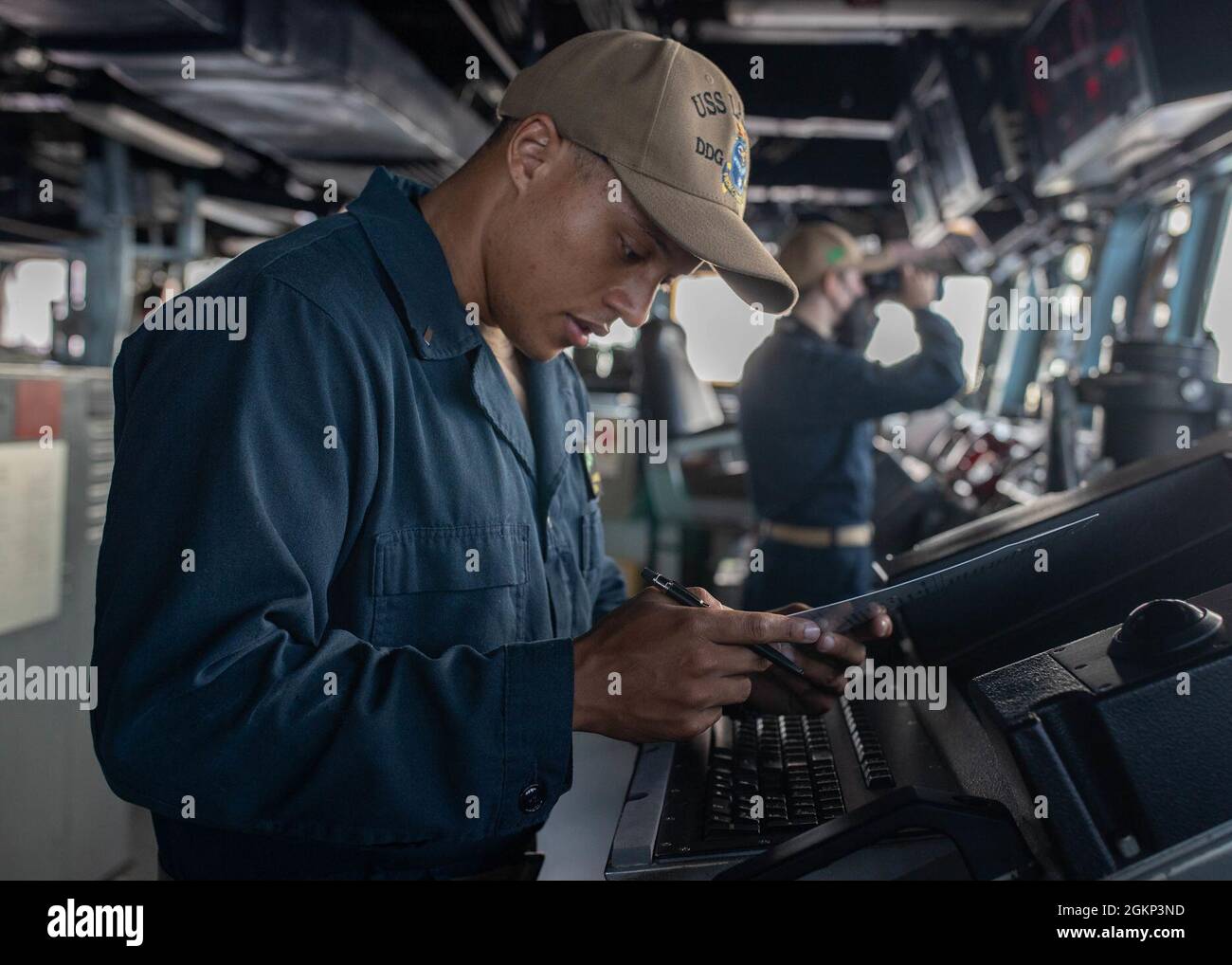 Lt. j.g. Jamel Brown, from Villa Rica, Georgia, assigned to the Arleigh ...