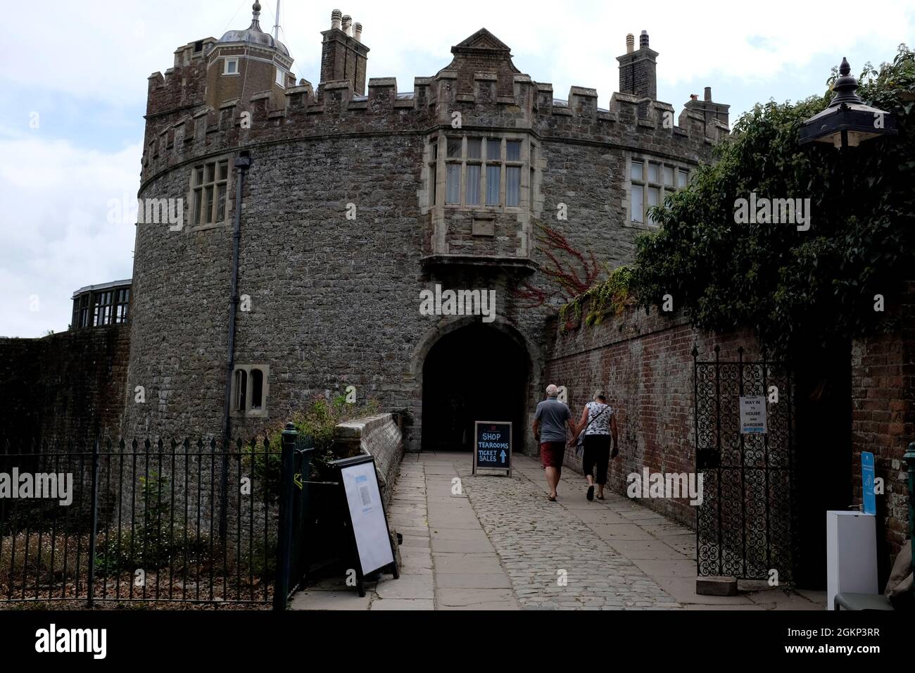 couple walking up to the entrance of walmer castle in coastal town of deal,east kent,uk september 2021 Stock Photo
