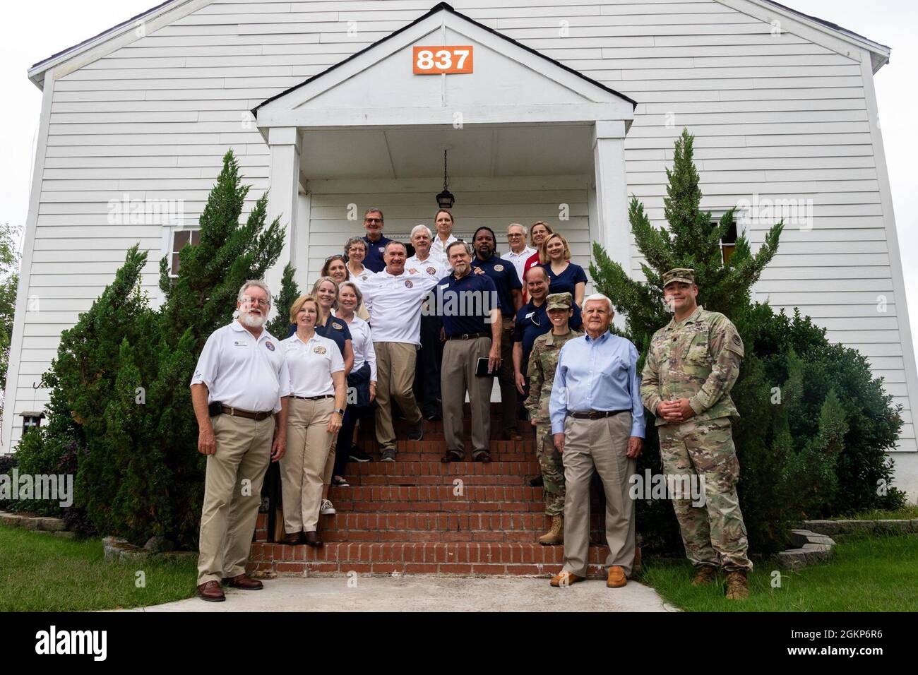 U.S. Georgia Army National Guardsmen and members of Cobb County Honorary Commanders Association stand for a group photograph at the chapel June 11, 2021 at Clay National Guard Center. This community engagement gives members of the Cobb County Honorary Commanders Association an opportunity to view the CNGC facilities. Stock Photo