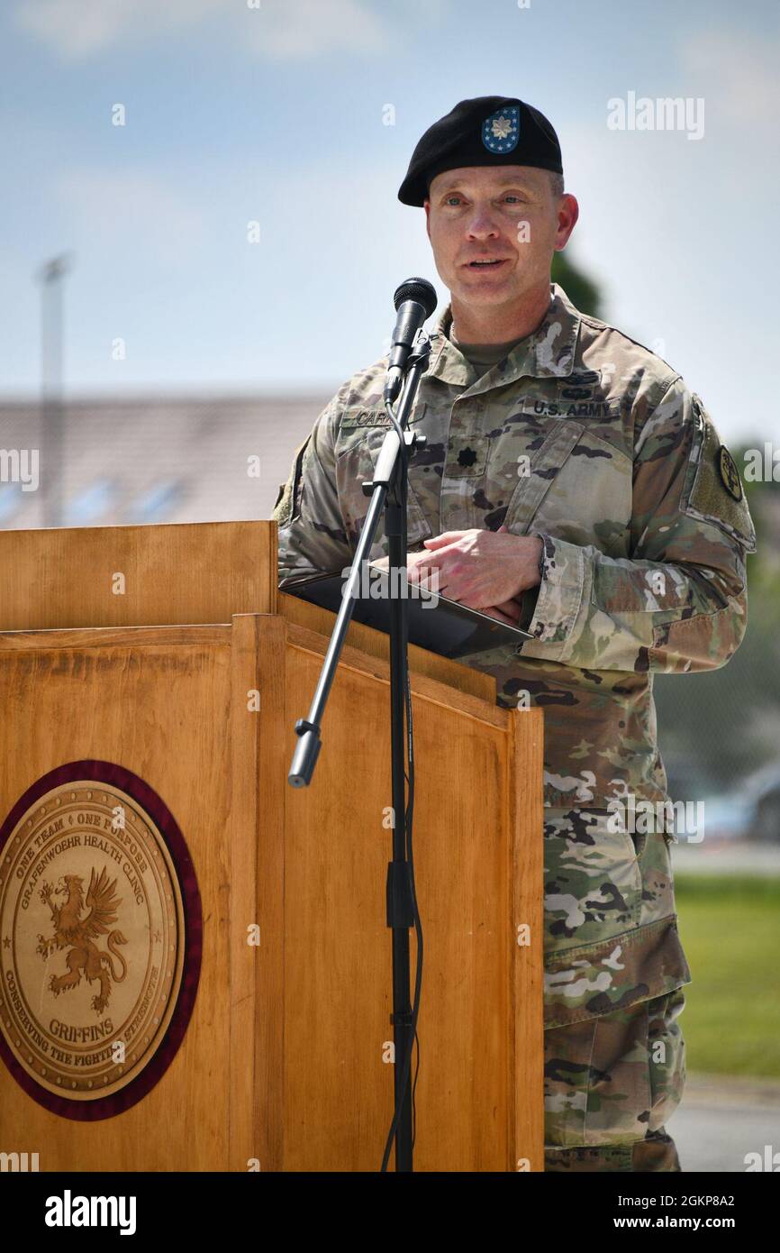 U.S. Army Lt. Col. Avery J. Carney, the U.S. Army Health Clinic Grafenwoehr outgoing commander, gives his parting remarks to the audience during the clinic’s Change of Command Ceremony at Tower Barracks, Grafenwoehr, Germany, June 11, 2021. Stock Photo