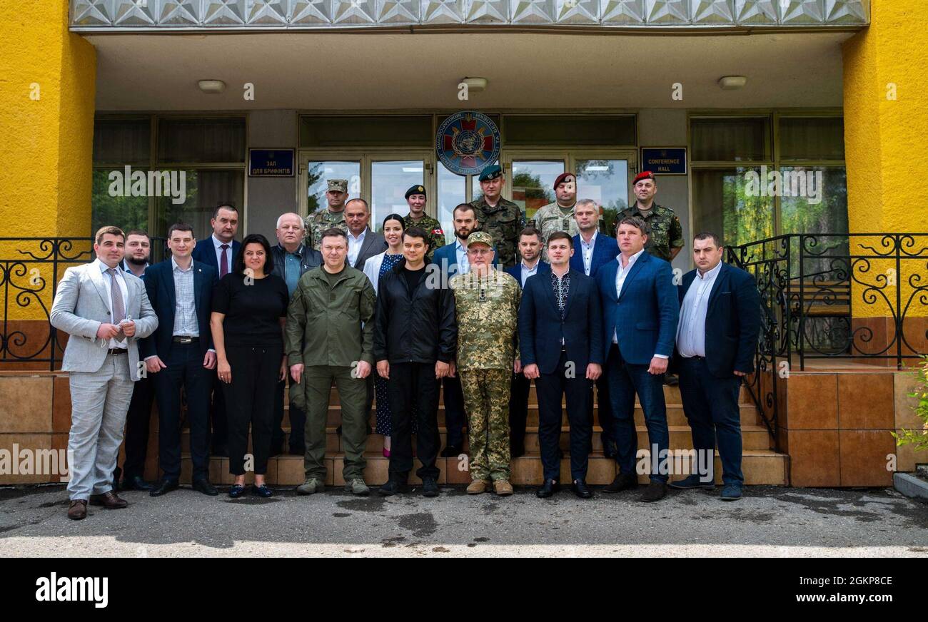 Task Force Raven welcomes Dmytro Razumkov, Chairman of the Verkhovna Rada and local civilian authorities at the Joint Multinational Training Group-Ukraine June 11, 2021.  The Chairman visited the International Peacekeeping and Security Center to gain a deeper understanding of how broad policy decisions are directly affecting Ukrainian soldiers. Stock Photo