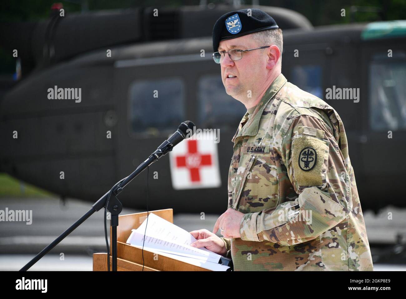 U.S. Army Medical Department Activity Bavaria commander U.S. Army Col. E. Lee Bryan addresses the audience in attendance during the U.S. Army Health Clinic Grafenwoehr Change of Command Ceremony at Tower Barracks, Grafenwoehr, Germany, June 11, 2021. Stock Photo