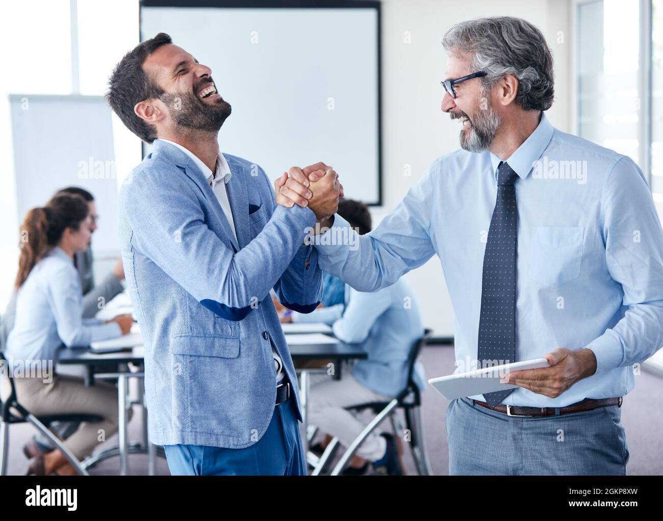 businessman office portrait corporate meeting tablet Stock Photo