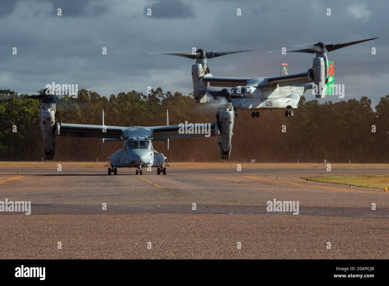 Two MV-22B Ospreys with Marine Rotational Force – Darwin land during Exercise Darrandarra at Gove Airport, Nhulunbuy, NT, Australia, June 12, 2021. The MV-22B Ospreys flew from Darwin to Nhulunbuy to deliver troops and equipment to support the exercise, demonstrating the Marine Corps’ long range airborne operation capabilities. Darrandarra, meaning “together,” demonstrates the Marines Corps’ ability to operate with the Australian Defence Force and train to reinforce embassies in response to crisis and contingencies in the Indo-Pacific region. Stock Photo