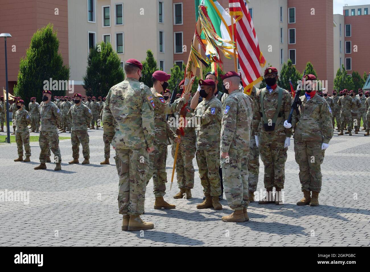 U.S. Army Lt. Col. Anthony P. Newman, incoming commander of 173rd Brigade Support Battalion, 173rd Airborne Brigade, passes the colors to Command Sgt. Asgar Kamaludeen during change of command ceremony under Covid-19 prevention condition at Caserma Del Din, Vicenza, Italy June 14, 2021. The 173rd Airborne Brigade is the U.S. Army Contingency Response Force in Europe, capable of projecting ready forces anywhere in the U.S. European, Africa or Central Commands' areas of responsibility. Stock Photo