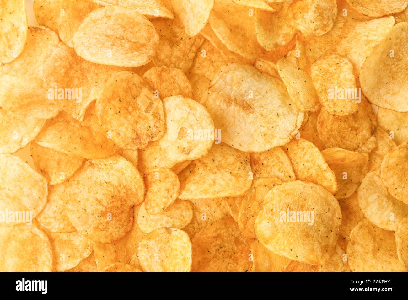 Potato chips as background Stock Photo - Alamy