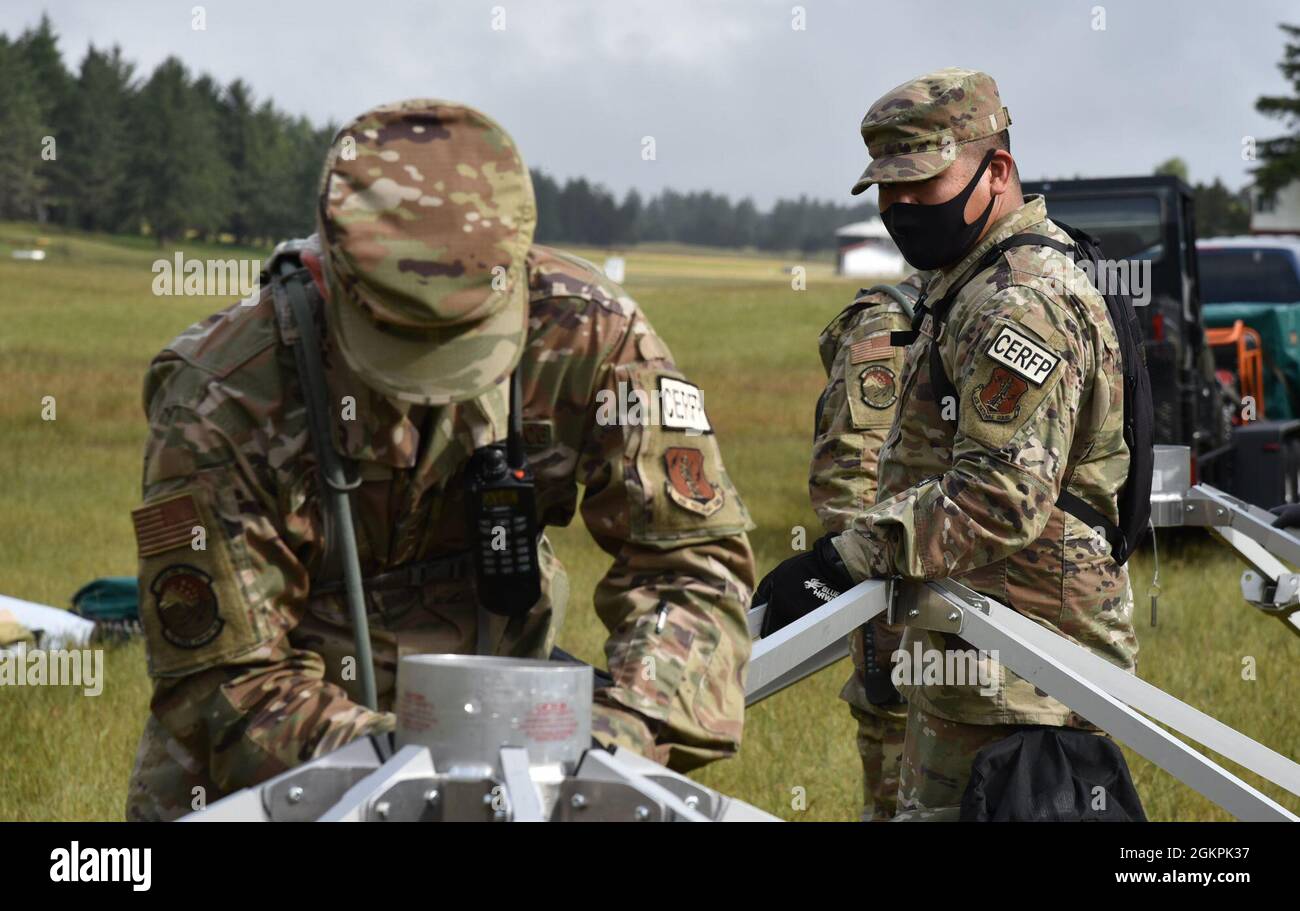 Airmen from the 142nd Force Support Squadron pitch a Tent Extendable