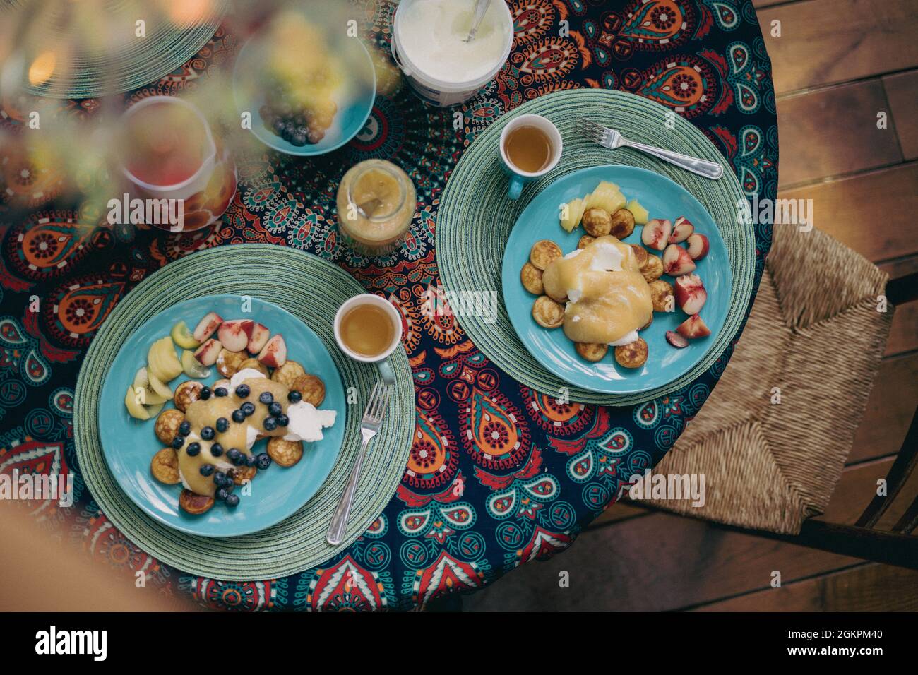 Breakfast with pancakes and fruit on the table Stock Photo