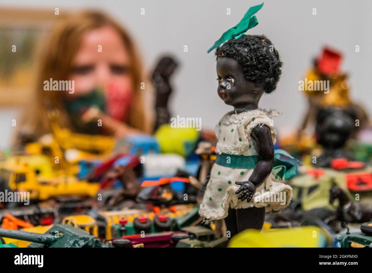 London, UK. 15th Sep, 2021. EXODUS, £43,200 die-cast collectable cars, antique dolls and mixed media, mounted steel frame on two Castrol drums, by Zak Ové - The Royal Academy (RA) Summer Exhibition 2021 co-ordinated by Yinka Shonibare RA. It explores the theme of ‘Reclaiming Magic' to celebrate the joy of creating art. It includes around 1400 works by emerging and established artists. Credit: Guy Bell/Alamy Live News Stock Photo