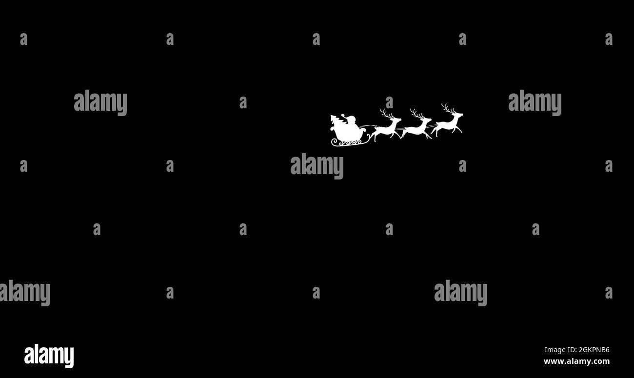 Digital image of silhouette of santa claus in sleigh being pulled by ...