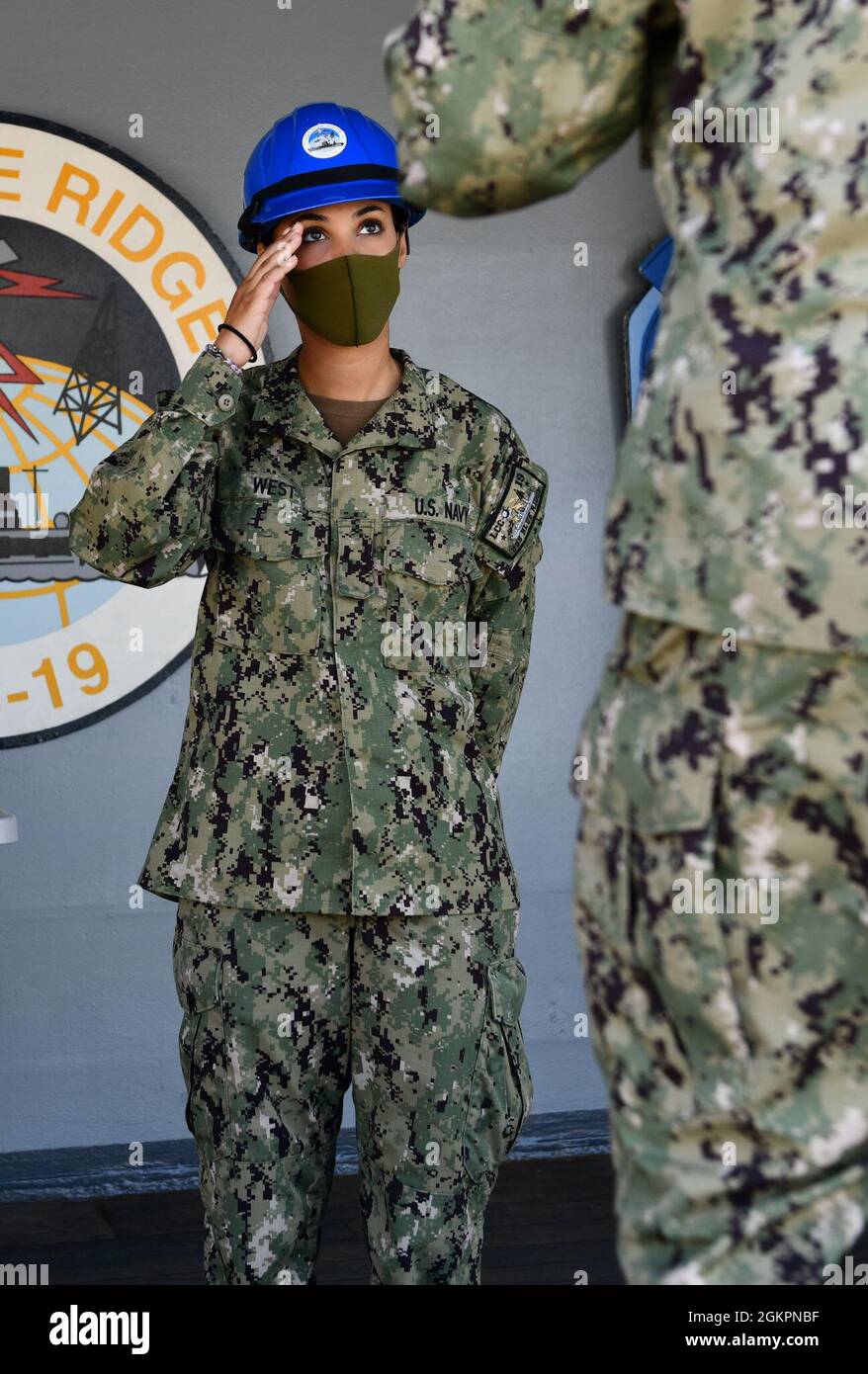 YOKOSUKA, Japan (June 15, 2021) Seaman Alexis West, from Orlando, Fla., stands as Messenger of