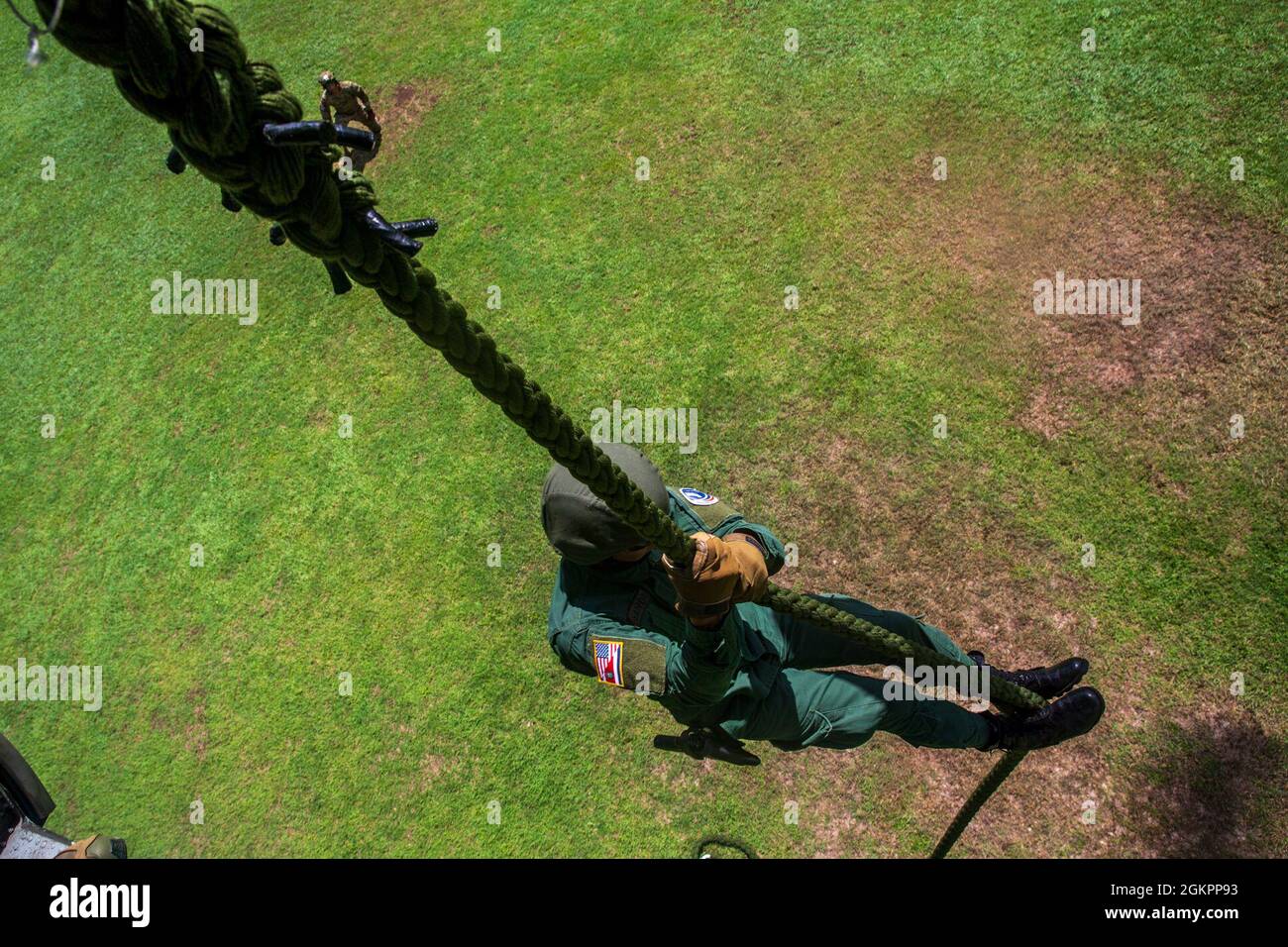 A member of the Costa Rican Police Forces fast ropes out of a U.S. Army ...