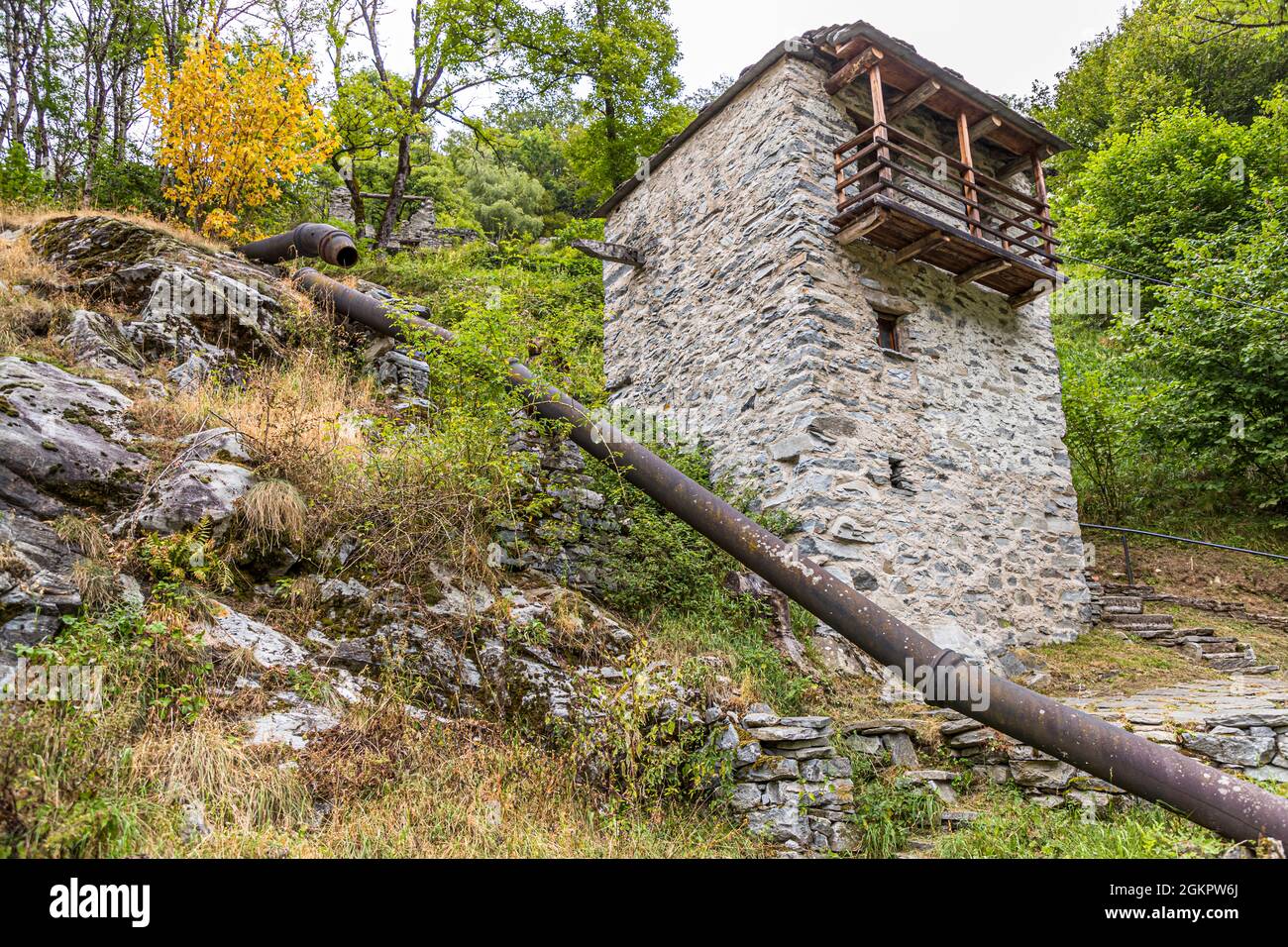 Vergeletto, with its original five mills, is something like the birthplace of the Farina bóna in Circolo d'Onsernone, Switzerland. The higher you climb up the Parco dei Mulini in Vergeletto, the worse the condition of the abandoned mills Stock Photo