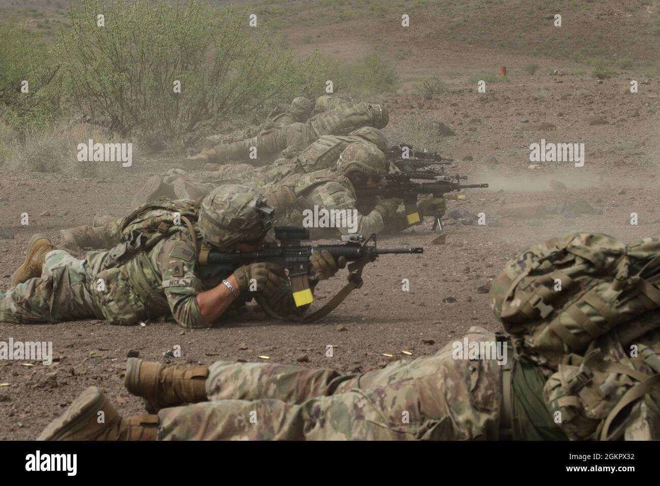 U.S. Army Soldiers assigned to Apache Company integrate with a heavy weapons platoon assigned to Dagger Company, both 1-102d Infantry Regiment (Mountain), 86th Infantry Brigade Combat Team, to conduct a platoon live fire in Djibouti, June 15, 2021.    Dagger Company, Task Force Iron Gray's Quick Reaction Force (QRF), utilized the Common Remotely Operated Weapon Station (CROWS), mounted with an M240, to provide fire support to dismounted troops during the platoon live fire.    Apache Company serves as the East Africa Response Force (EARF), which provides a combat-ready rapid deployment capabili Stock Photo