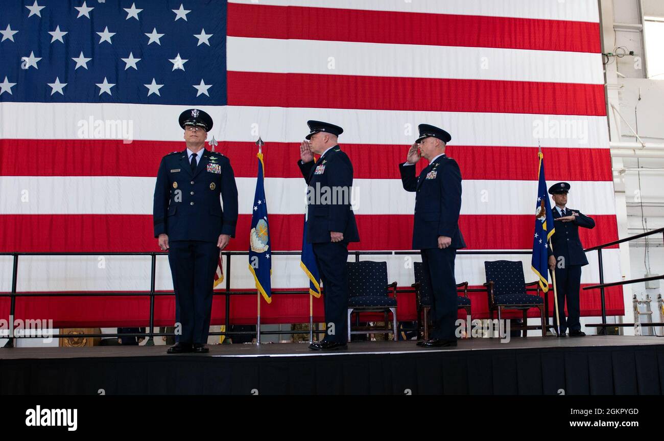 Members of the 509th Bomb Wing, render a salute to U.S. Air Force Maj. Gen. Mark Weatherington, Eighth Air Force and Joint-Global Strike Operations Center commander, during the 509th BW change of command ceremony, Whiteman Air Force Base, Missouri, June 16, 2021. Eighth Air Force is responsible for the service’s bomber force and airborne nuclear command and control assets. The J-GSOC serves as the central command and control node for all operations within Air Force Global Strike Command, orchestrating warfighting and readiness activities for the Commander, Air Forces Strategic. Stock Photo