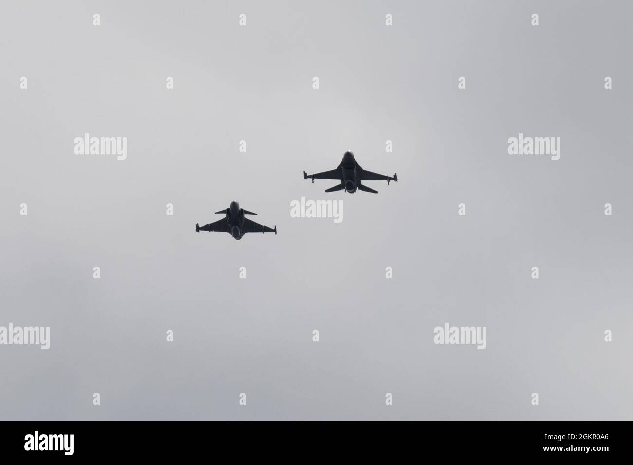A Swedish air force JAS-39 Gripen, left, flies in formation with a U.S. Air  Force F-16 assigned to the 480th Fighter Squadron at Spangdahlem Air Base,  Germany, during the Arctic Challenge Exercise