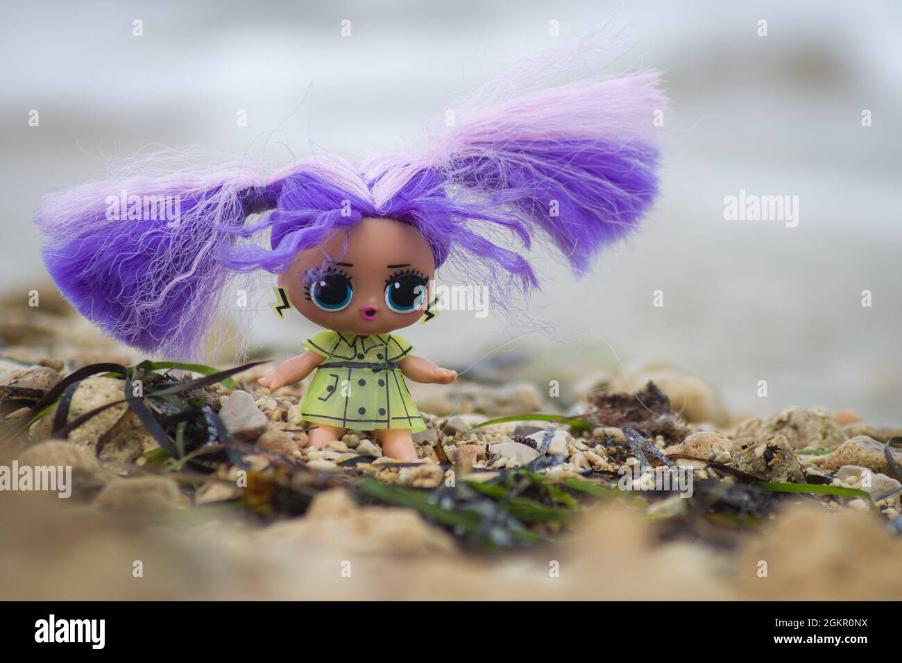 Baby playing barbie doll hi-res stock photography and images - Alamy