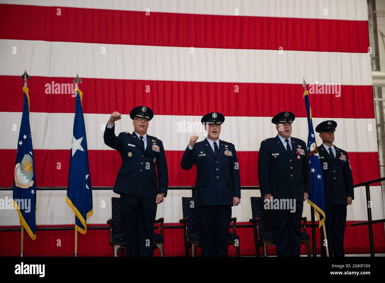 U.S. Air Force Maj. Gen. Mark Weatherington, Eighth Air Force and Joint-Global Strike Operations Center commander, officiates the 509th Bomb Wing change of command ceremony, Whiteman Air Force Base, Missouri, June 16, 2021. Military change of command ceremonies are a time honored tradition that symbolizes the continuity of authority as the command passes from one individual to another, and is symbolized by the handing the unit flag from the outgoing commander to the new. During the ceremony, Weatherington passed the unit flag from Col. Jeffrey Schreiner to Col. Daniel Diehl. Stock Photo
