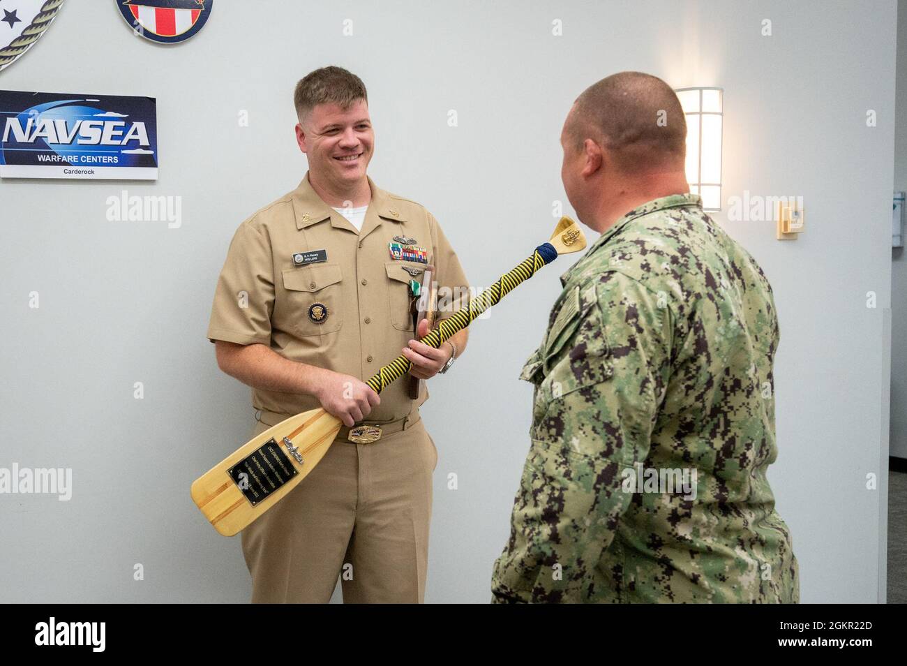 WASHINGTON, DC (June 16, 2021) – Senior Chief Culinary Specialist Korhy Flanary receives a commemorative paddle during his end-of-tour award ceremony, held onboard Washington Navy Yard. Stock Photo