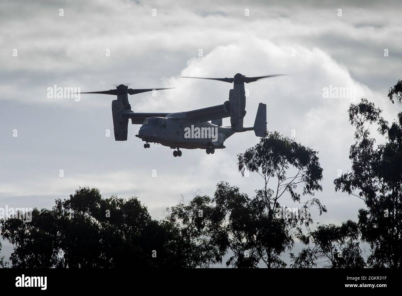 U.S. Marines with Marine Medium Tiltrotor Squadron 363 (Reinforced), Marine Rotational Force - Darwin land an MV-22B Osprey at Gove Airport in Nhulunbuy, NT, Australia, June 17, 2021. Marines redeployed from Nhulunbuy to Darwin on MV-22B Ospreys after the successful completion of Exercise Darrandarra. Darrandarra, meaning “together,” demonstrates the Marines Corps’ ability to operate with the Australian Defence Force and reinforce embassies and conduct noncombatant evacuation operations in response to crises and contingencies in the Indo-Pacific region. Stock Photo