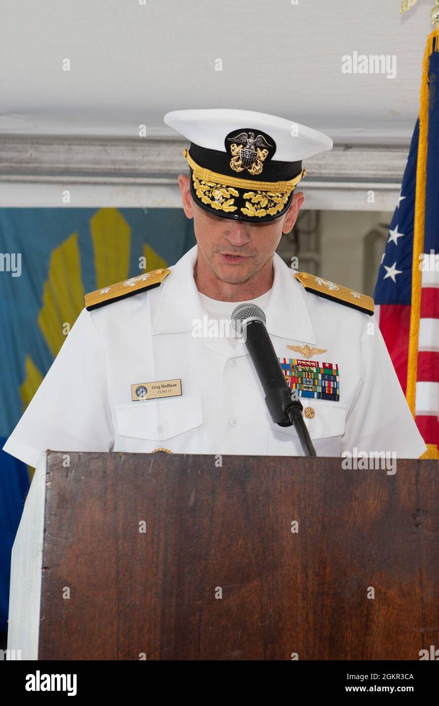 NORFOLK (Jun. 17, 2021) - Rear Adm. Gregory Huffman reads his orders during the Carrier Strike Group (CSG) 12 Change of Command ceremony aboard the guided-missile destroyer USS Bulkeley (DDG 84) June 17. Rear Adm. Craig Clapperton, Commander, CSG-12, turned over his command to Rear Adm. Gregory Huffman. Stock Photo