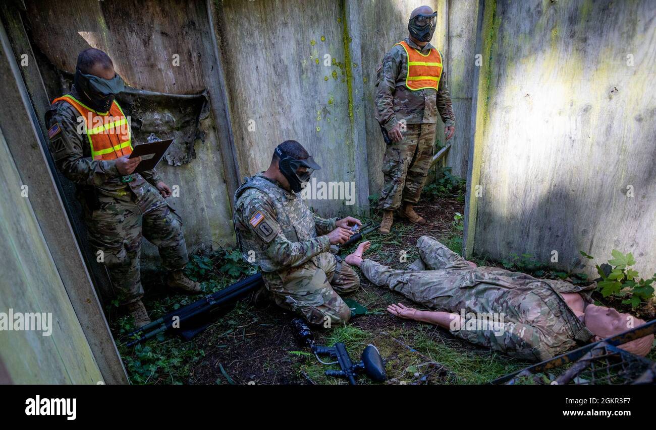 Andrew Ruff Grid Cadre from Regional Health Command Pacific observe as Master Sgt ...