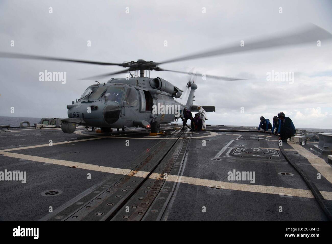 210617-N-CZ893-1271 PACIFIC OCEAN (June 17, 2021) Sailors refuel an MH ...