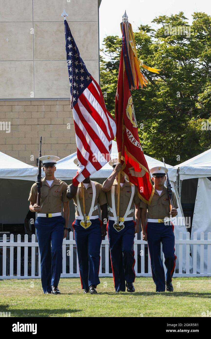 The 1st Marine Division (1st MARDIV) Color Guard participates in the graduation ceremony of The Preuss School University of California San Diego in San Diego, California, June 17, 2021. The 1st MARDIV Color Guard attended the graduation to reinforce relationships with the local community. Stock Photo