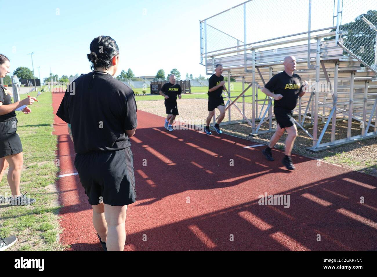 Lt. Col. Terry L. Martin, chief of Individual Training for the U.S. Army  Civil Affairs and Psychological Operations Command (Airborne) (right),  followed by Col. Ray C. Phariss, chief of staff for USACAPOC(A),, image size:1300x956