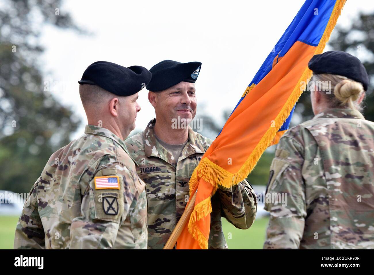 U.S. Army Col. Richard P. Tucker receives the unit colors for the first