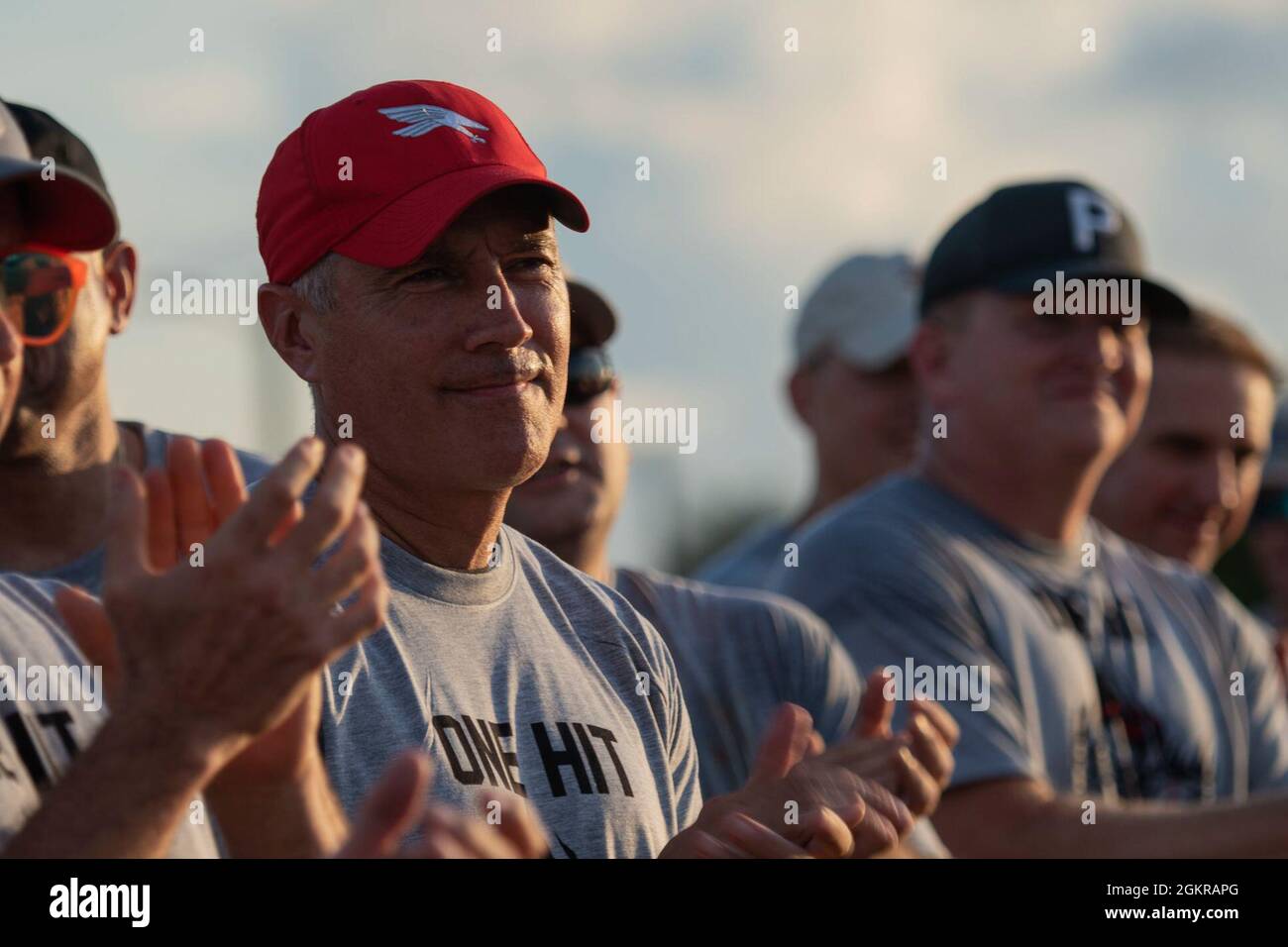 U.S. Air Force Brig. Gen. Jeremy Sloane, 36th Wing commander, claps for the opposing team during the Chief’s versus Eagle’s softball game at Andersen Air Force Base, Guam, June 18, 2021. Sloane led the Eagle’s to victory with a 18 to 14 win against the Chief’s. Stock Photo