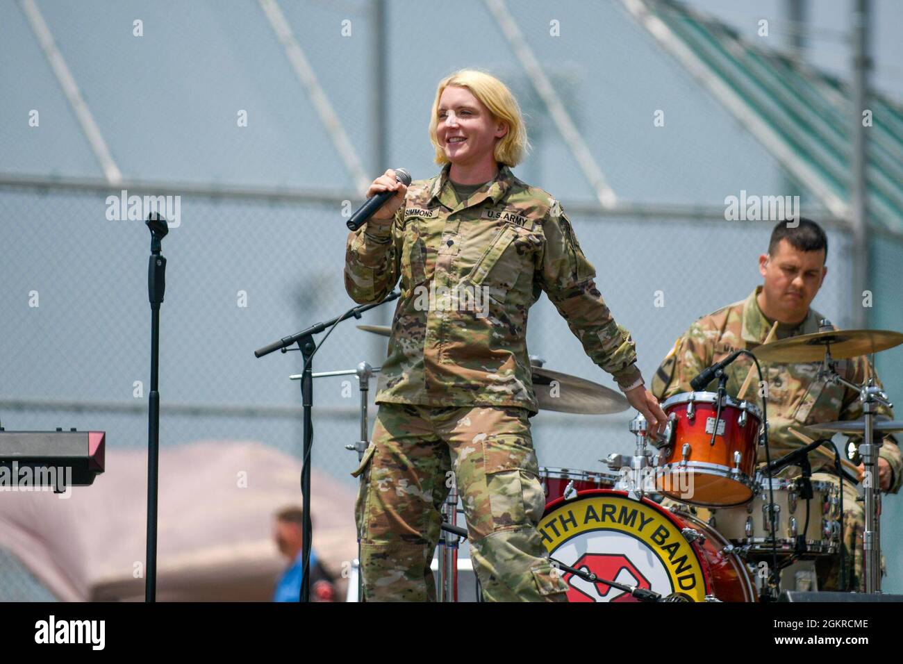 CAMP HUMPHREYS, Republic of Korea - Spc. Brittany Simmons, a musician assigned to the Eighth Army Band, performs alongside the band during the Juneteenth celebration here, June 19. The Eighth Army Band's performance was one of many events during the celebration which commemorated the emancipation of enslaved peoples in the United States and the celebration of African American heritage and culture. Stock Photo