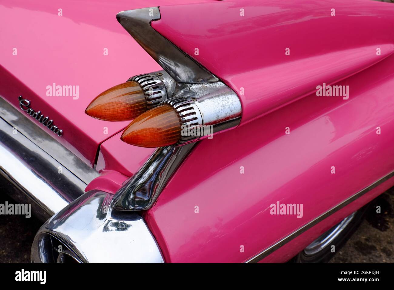 Rear fin and lights of vintage pink Cadillac, Havana, Cuba, West Indies, Central America Stock Photo
