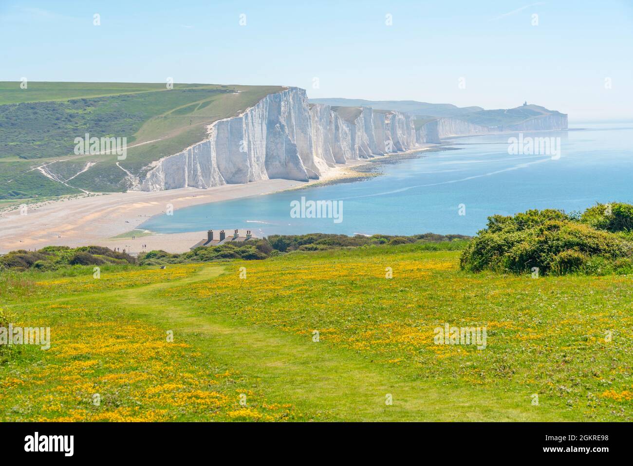 View of Seven Sisters Chalk Cliffs and Coastguard Cottages at Cuckmere Haven, South Downs National Park, East Sussex, England, United Kingdom, Europe Stock Photo