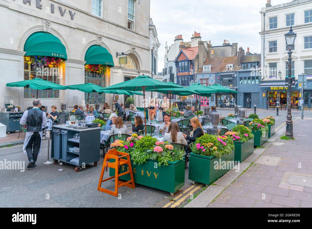 View of The Ivy Restaurant, Alfresco dining in The Lanes at dusk, Brighton, Sussex, England, United Kingdom, Europe Stock Photo