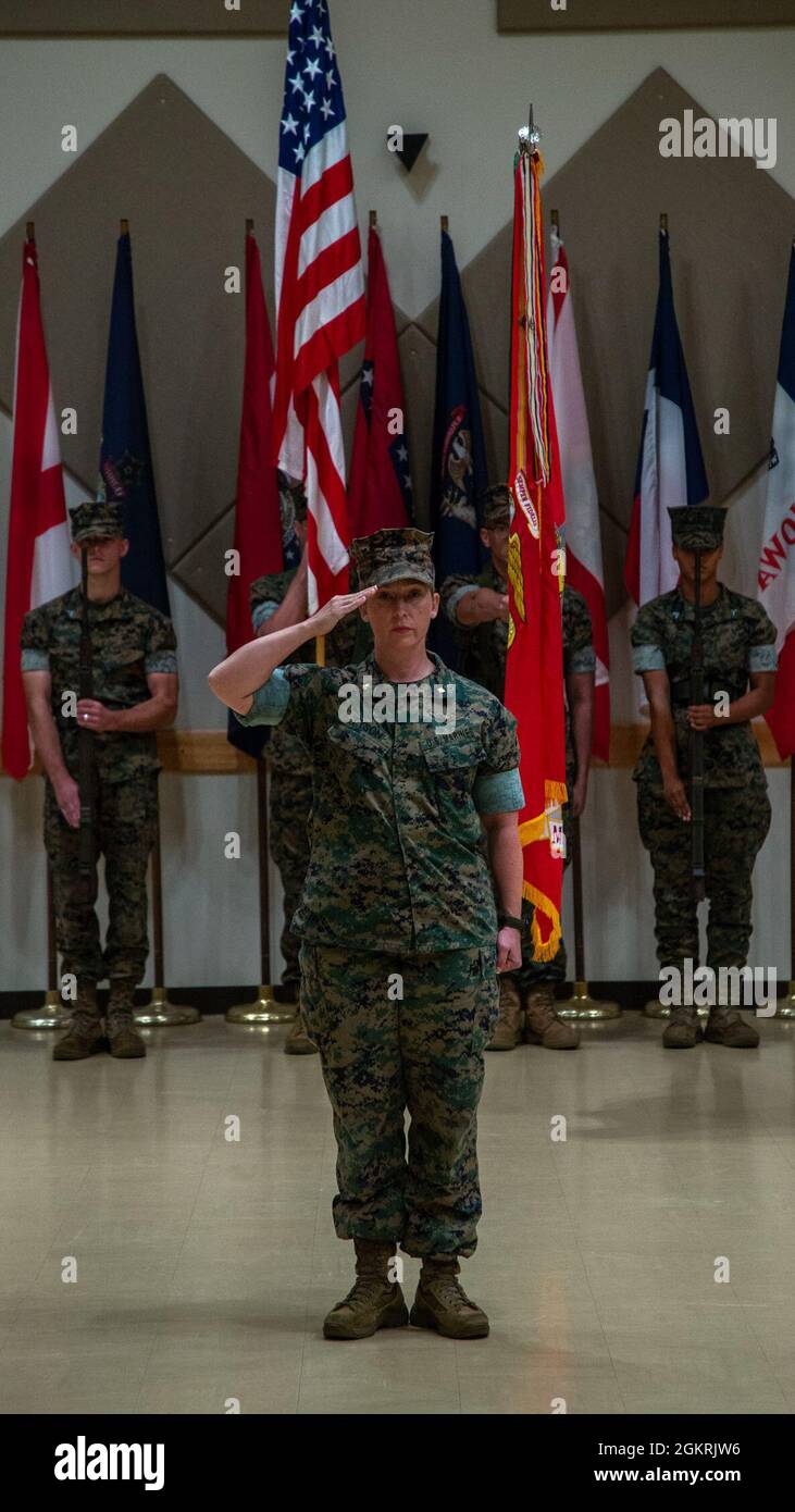 U.S. Marine Corps Maj. Serena Tyson, executive officer of Marine Wing Support Squadron (MWSS) 172, serves as the commander of troops during a change of command ceremony at Camp Foster, Okinawa, Japan, June 22, 2021. During the ceremony, Lt. Col. Jim Pryor passed command of MWSS-172 to Lt. Col. Kevin Misner. Stock Photo
