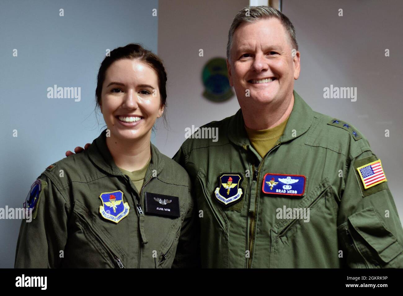 U.S. Air Force 2nd Lt. Alana Daum stands with Lt. Gen. Brad Webb, Air  Education and Training Command commander, following her graduation from  Specialized Undergraduate Helicopter Pilot Training, Class 21-05, at Fort