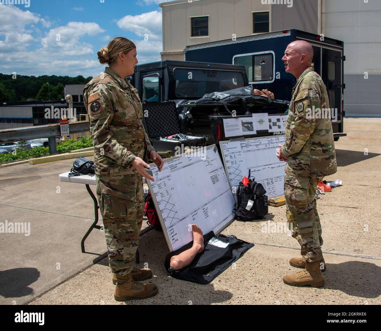 Pennsylvania Air National Guardsman, Tech. Sgt. Kayla Stapf, left, 171st Force Support Squadron, briefs Maj. Gen. Mark J. Schindler, Adjutant General of Pennsylvania, about the capabilities of the fatality search and recovery team, during his visit to the 171st, June 22, 2021, in Coraopolis, Pennsylvania. An FSRT specializes in the recovery of human remains in a mass fatality incident. Stock Photo