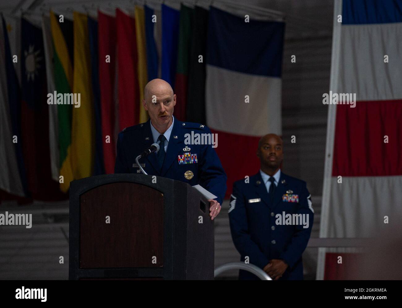 Col. Christopher Workinger, 365th Intelligence, Surveillance and Reconnaissance Group (ISRG) commander, gives a speech after assuming command at a change of command ceremony at Nellis Air Force Base, Nevada, June 22, 2021. As the 365th ISRG commander, Workinger will provide content-dominant, all-source intelligence products for Combatant Commanders and Air Force Tactical Commanders to prepare for and execute operational and tactical missions. Stock Photo