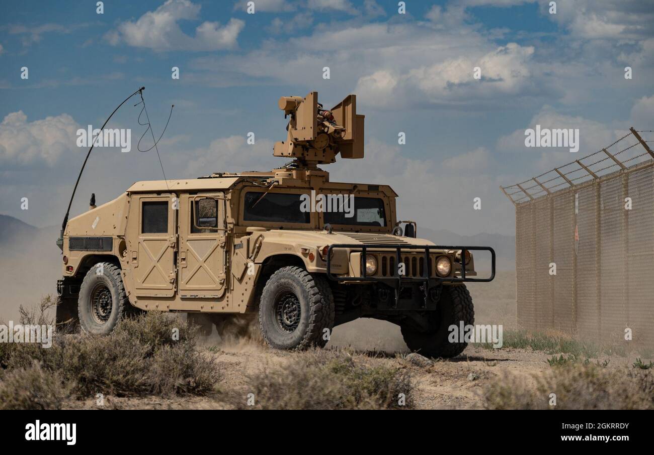 A M1167 Humvee with a mounted Common Remotely Operated Weapons Station (CROWS) drives through the Fallon Range Training Complex, Nev., June 23, 2021.  Soldiers from the 609th Engineer Company and Airmen from the 152nd Security Forces Squadron were providing support for Operation Resolute Hunter. Stock Photo