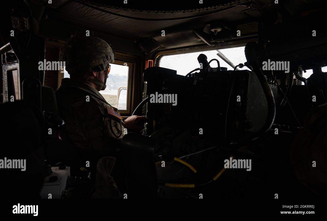 U.S. Army 1st Lt. Philip Fred, 609th Engineer Company, Nevada Army National Guard, drives a M1167 Humvee during Operation Resolute Hunter at the Fallon Range Training Complex, Nev., June 23, 2021. Airmen from the 152nd Security Forces Squadron and Soldiers from the 609th Engineer Company trained together on Humvee operations and navigation procedures. Stock Photo