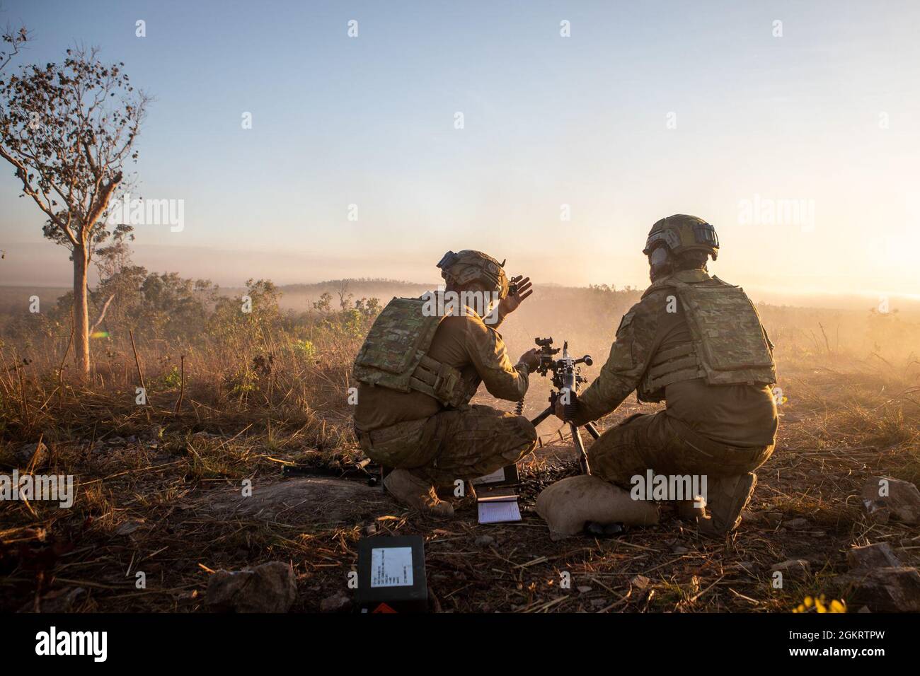 Australian Army soldiers fire an Australian MAG 58 general support ...