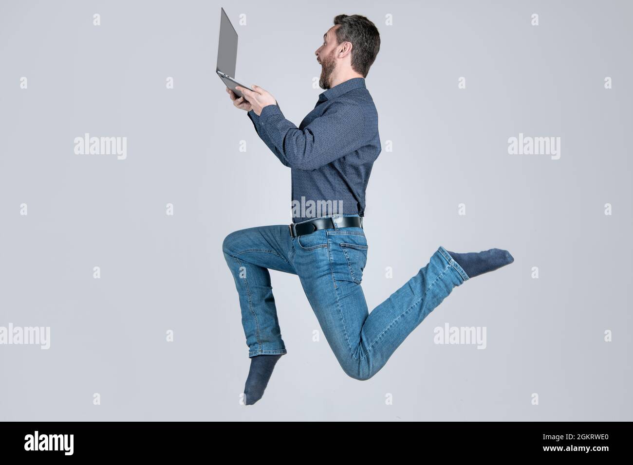 agile business. network administrator hold computer. energetic boss with wireless laptop. Stock Photo