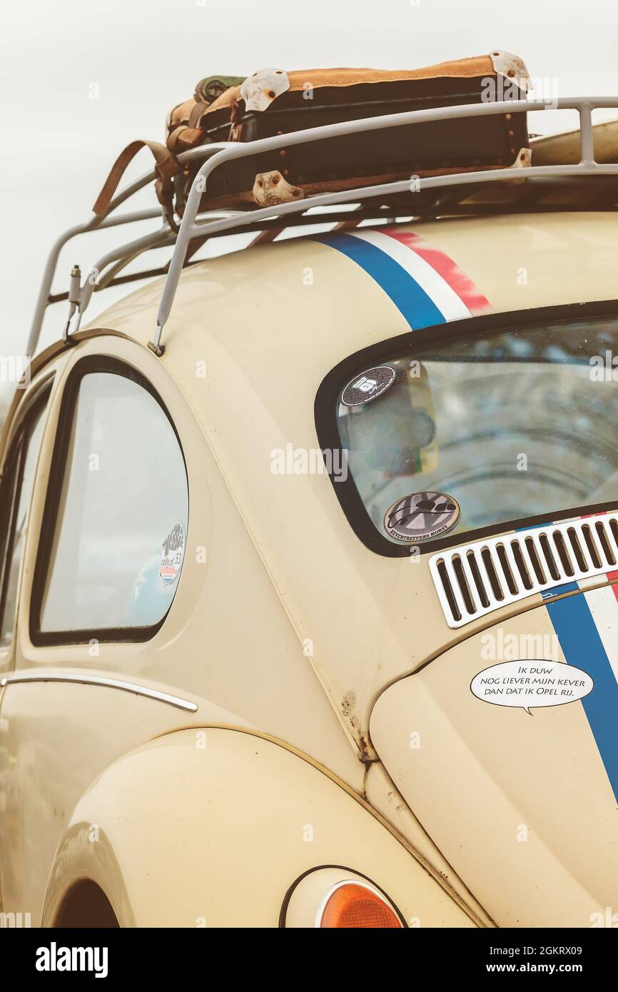 ROSMALEN, THE NETHERLANDS - JANUARY 8, 2017: Vintage Volkswagen Beetle from the seventies with luggage on top in Rosmalen, The Netherlands Stock Photo