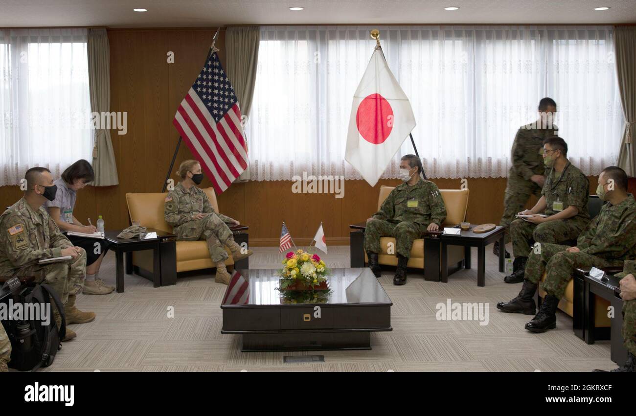 U.S. Army Maj. Gen. Laura Yeager, 40th Infantry Division commander, and Japan Ground Self-Defense Force Lt. Gen. Shin Nozawa, Middle Army commander, meet at Camp Itami in Japan on June 24, 2021 at the start of bilateral exercise Orient Shield 21-2. Stock Photo