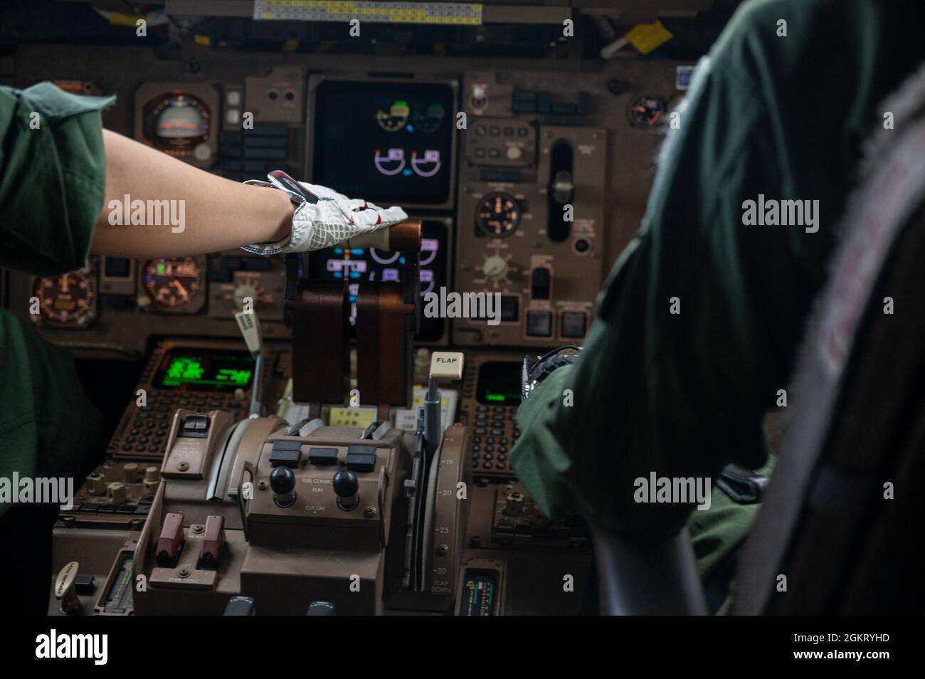 Japan Air Self-Defense Force Maj Yasuhiro Sugiyama, left, holds a ...