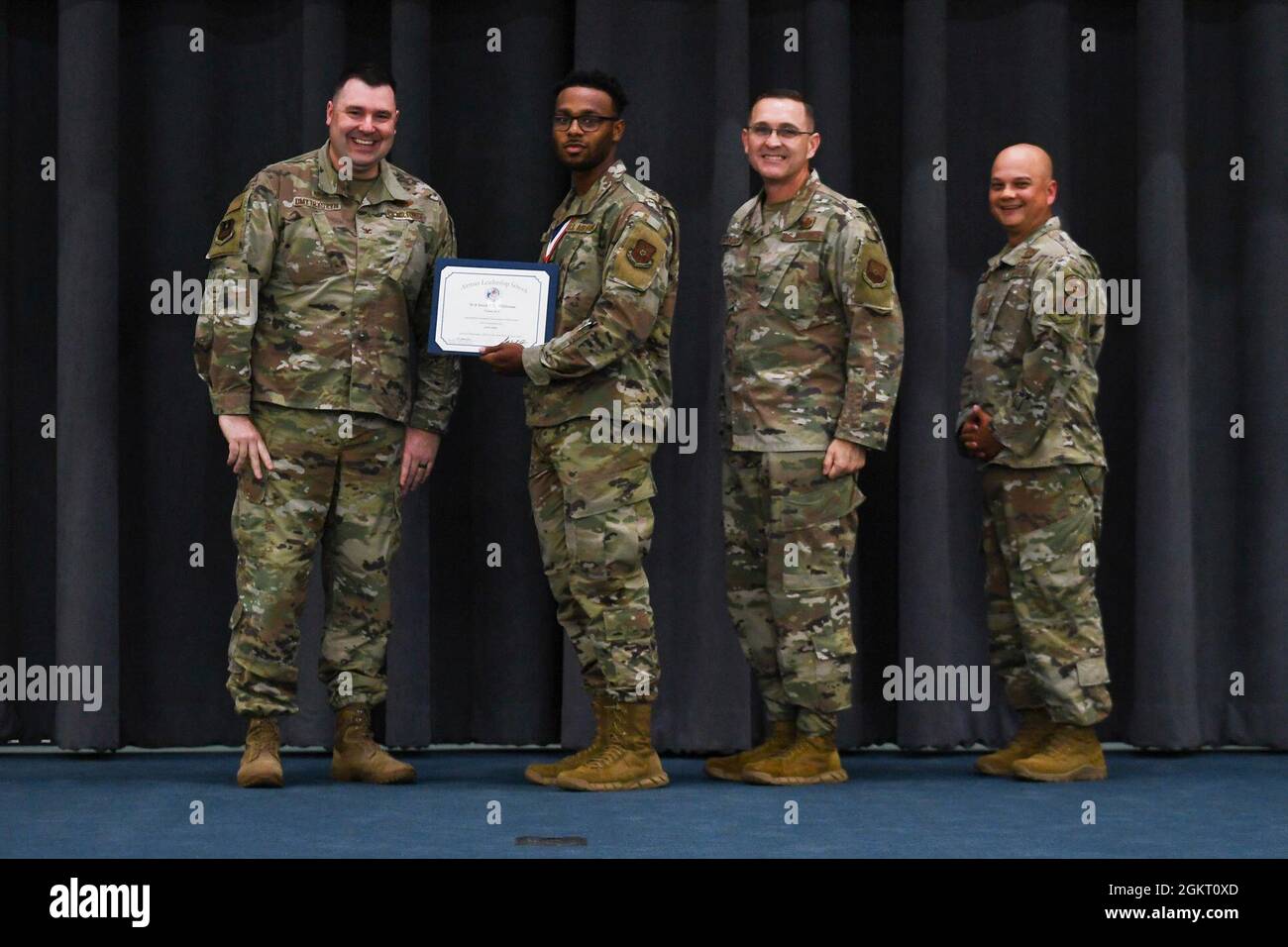 Graduates from Airman Leadership School Class 21-5 receive their ...