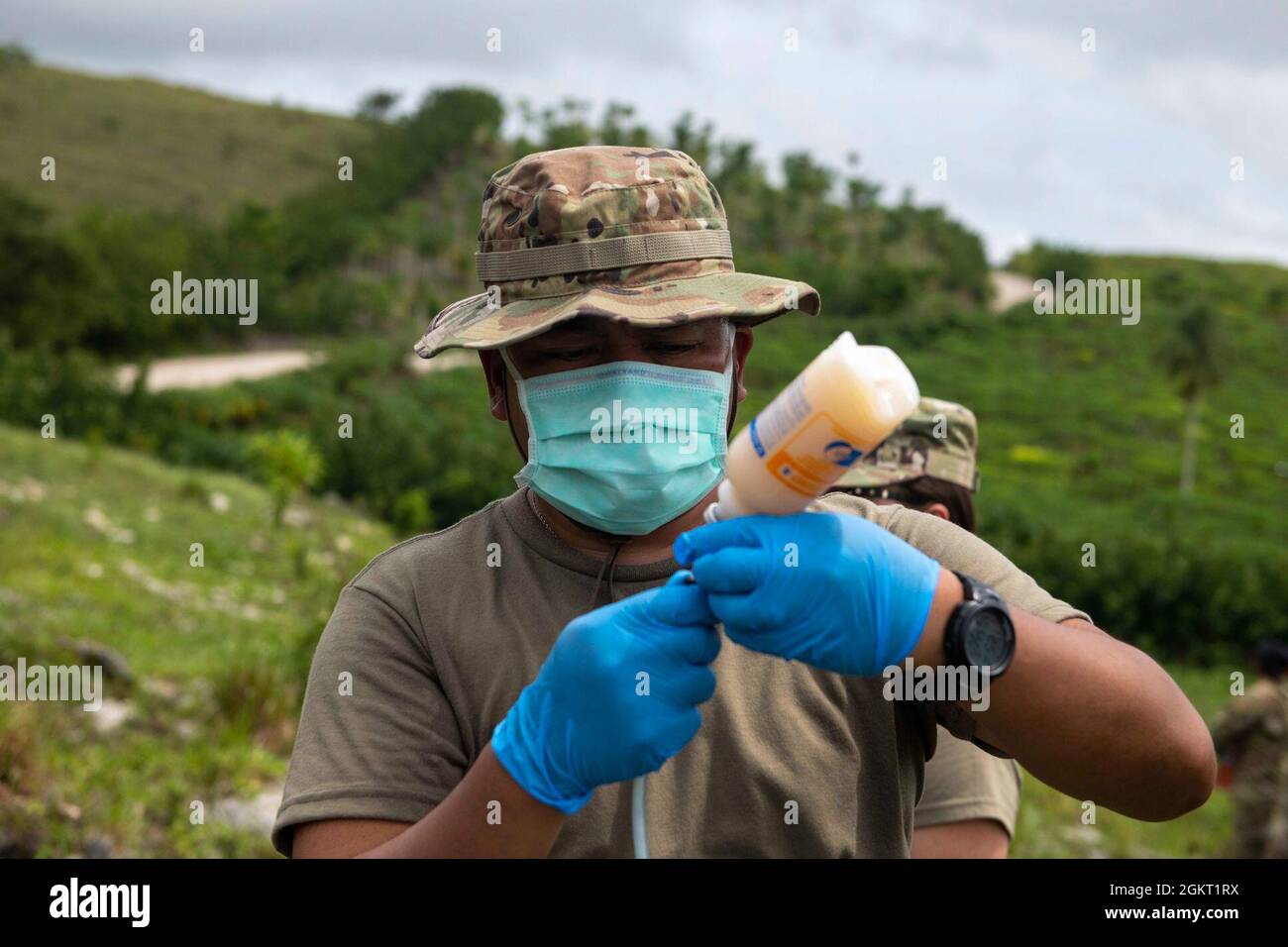 U.S. Army Staff Sgt. Rene Aventura, a field veterinary service technician with the 109th Medical Detachment Veterinary Services out of Garden Grove, California, prepares vaccines for cattle during the Veterinary Readiness Training Exercises portion of Resolute Sentinel 21 in Melchor De Mencos, Guatemala, June 24, 2021. Resolute Sentinel provides joint training and improved readiness of U.S. and partner nation veterinary professionals and support personnel through humanitarian assistance activities. Stock Photo