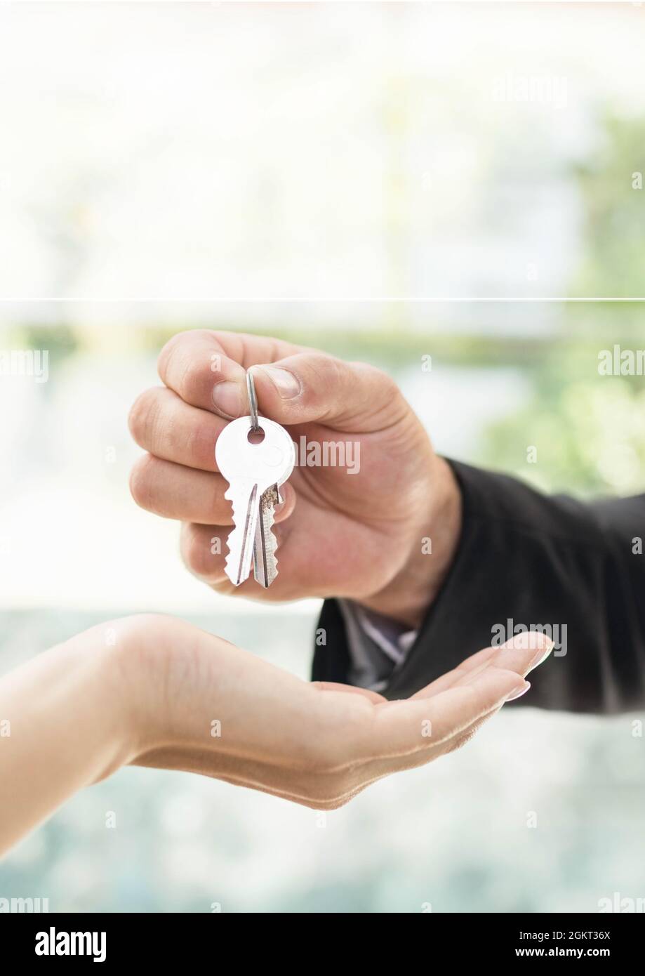 Close up of real estate agent giving keys house to customer Stock Photo ...